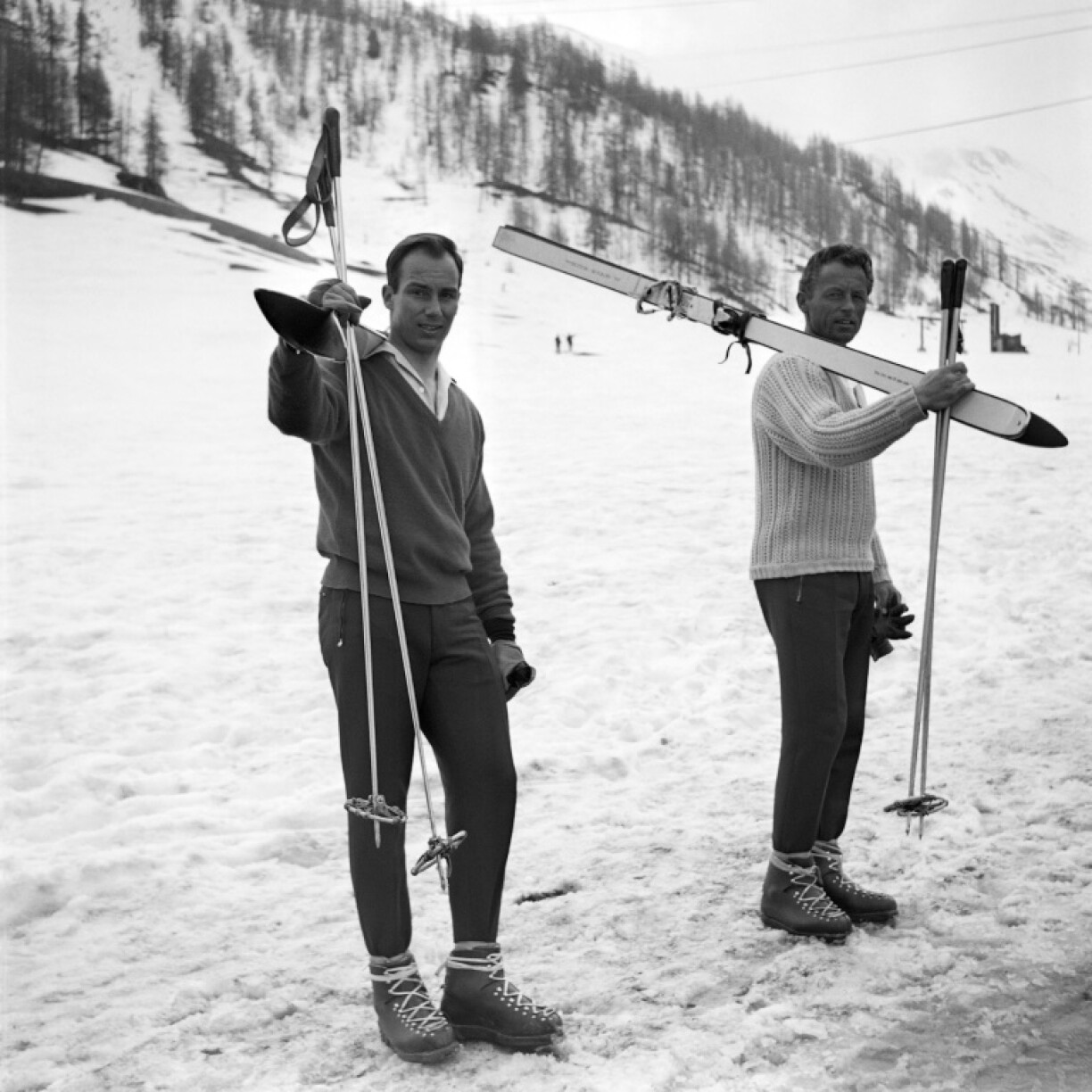 The Aga Khan (L) training on the slopes of Val d'Isere with his ski instructor Hans Senger six years after his 1964 venture at the Innsbruck Winter Olympics