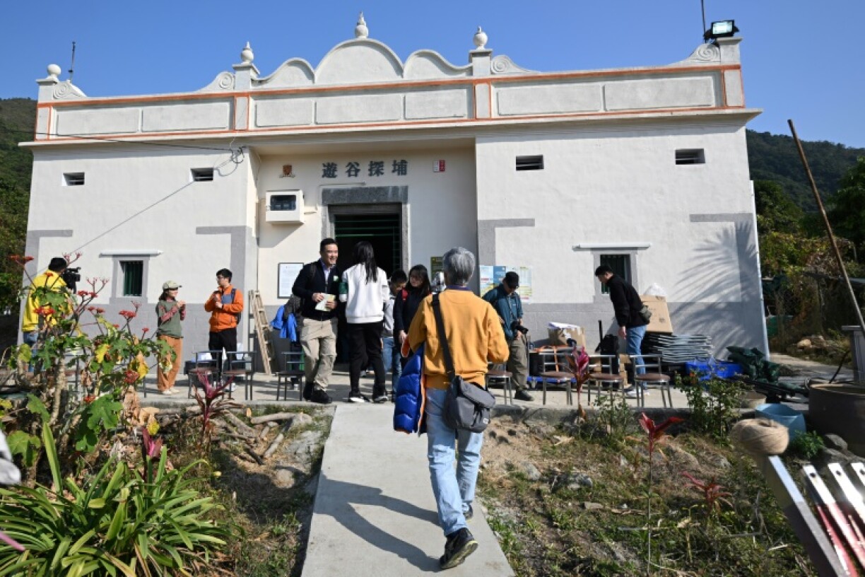 Lilian Lee welcomes visitors into her family's two-storey ancestral home, built nearly a century ago