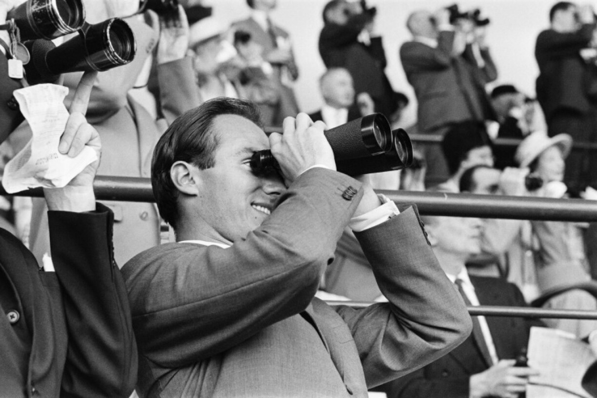 The Aga Khan keeping an eye on the action at the Grand Prix de Saint-Cloud in July 1961