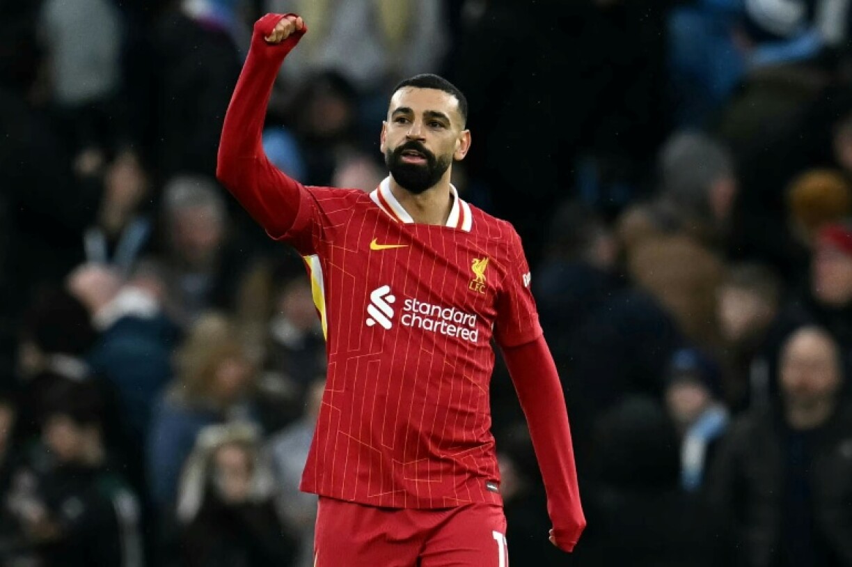 Mohamed Salah guided Liverpool to an 11-point Premier League lead
