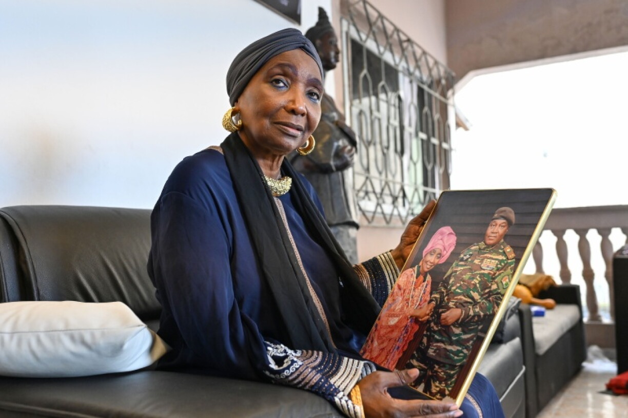 Ivorian diva Aicha Kone, shown holding a photo of herself with Niger's leader General Abdourahamane Tiani, is a Sahel junta supporter