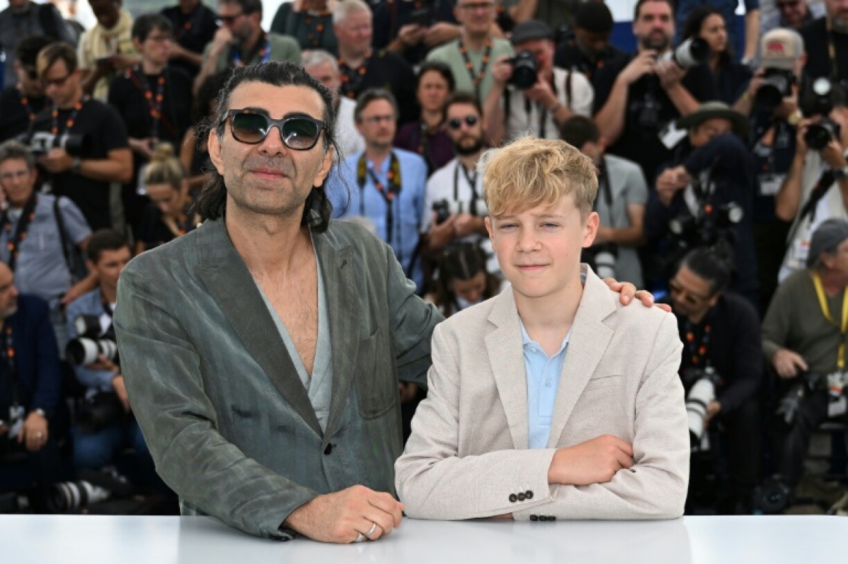 Akin (L) and actor Jasper Billerbeck, who plays the son of a Nazi family in the film 'Amrum'