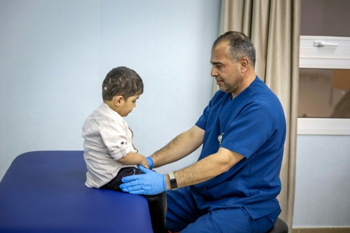 A doctor in Abu Dhabi cares for a Palestinian child injured in the Gaza Strip during the war between Israel and Hamas