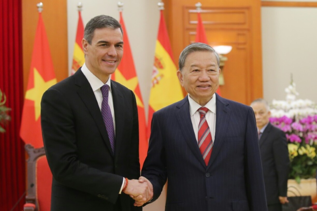 Spain's Prime Minister Pedro Sanchez (L) meets Vietnam President To Lam in Hanoi