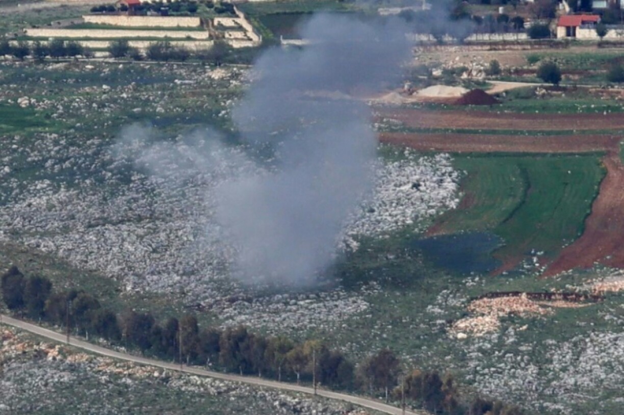 An Israeli shell hits farmland near the south Lebanon village of Yohmor as defence chiefs threaten a severe response to renewed rocket fire from Lebanon.