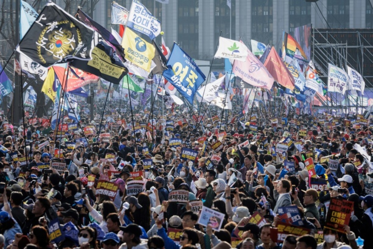 Protesters attend a demonstration against impeached South Korean President Yoon Suk Yeol in Seoul on March 22, 2025