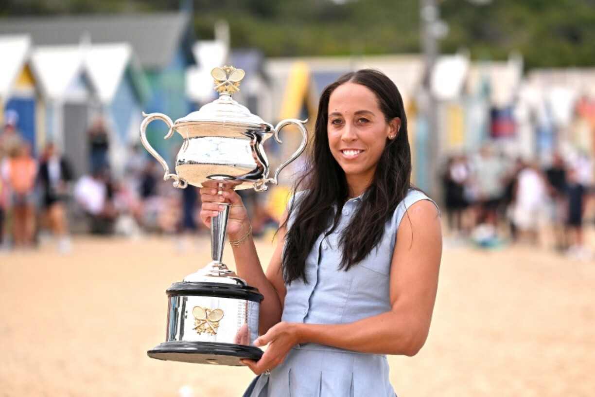 Madison Keys holds the Australian Open trophy on Brighton Beach in Melbourne on Sunday