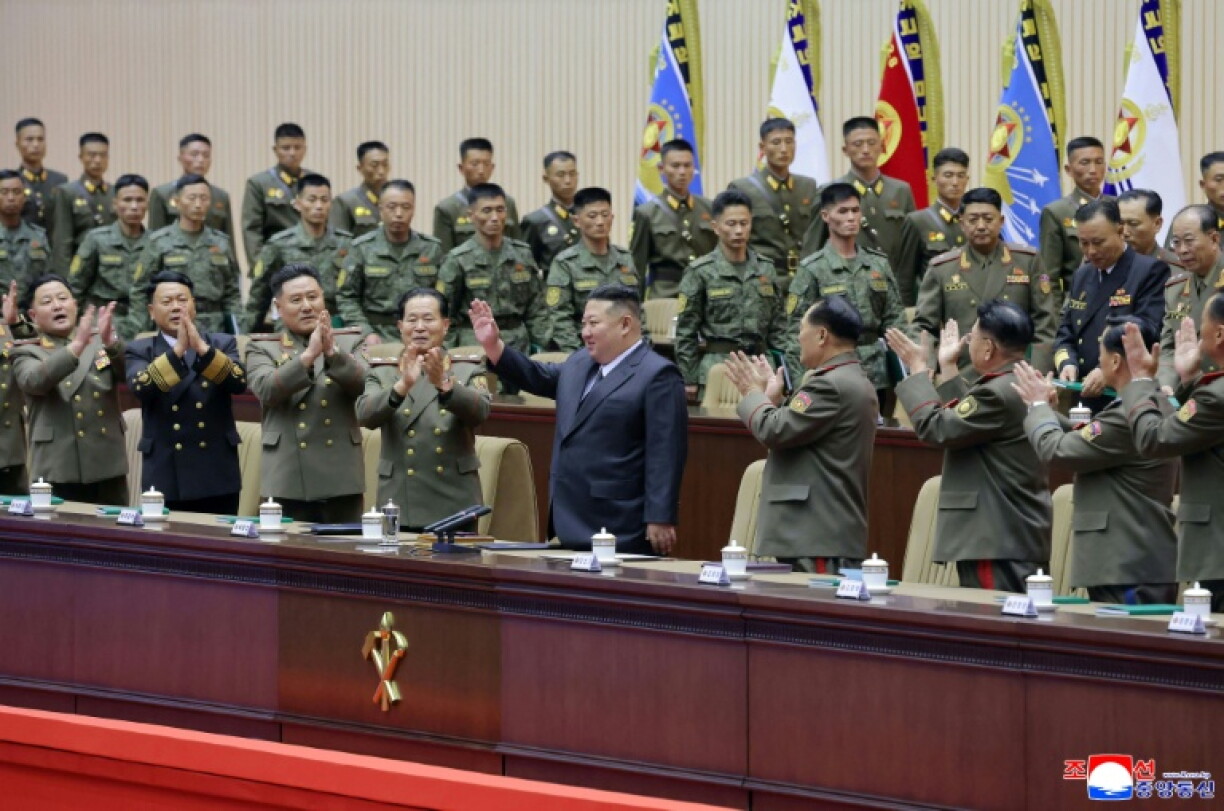 North Korean leader Kim Jong Un (C) attends a meeting of the Korean People's Army in Pyongyang.