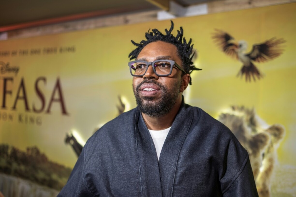 South African actor Kagiso Lediga, who voices the young Rafiki in 'Mufasa: The Lion King,' poses during the film's South African premiere in Johannesburg on December 12, 2024