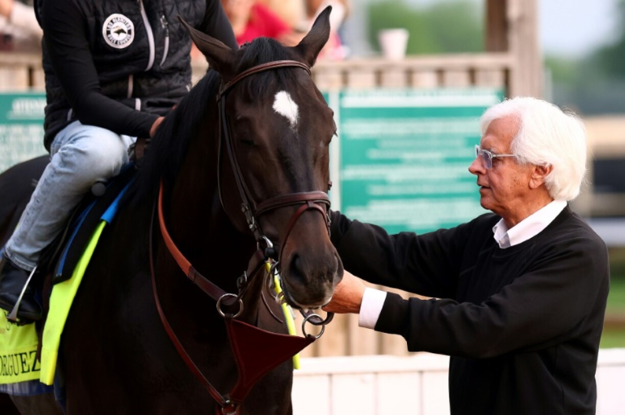 Trainer Bob Baffert stands with Rodriguez, one of his two entries in the 151st Kentucky Derby as he returns to the race after a three-year ban by Churchill Downs
