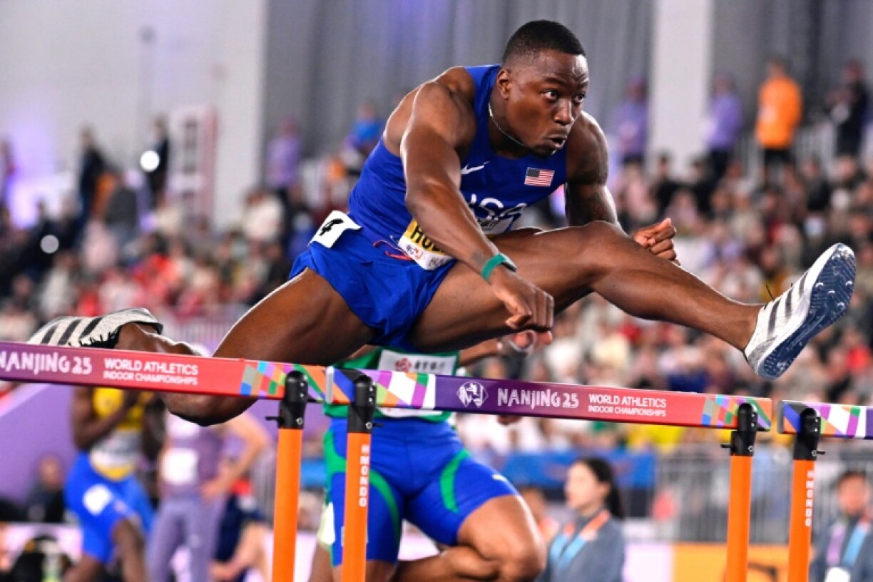 USA's Grant Holloway in action in the 60m hurdles at the world indoor athletics championships in Nanjing, China