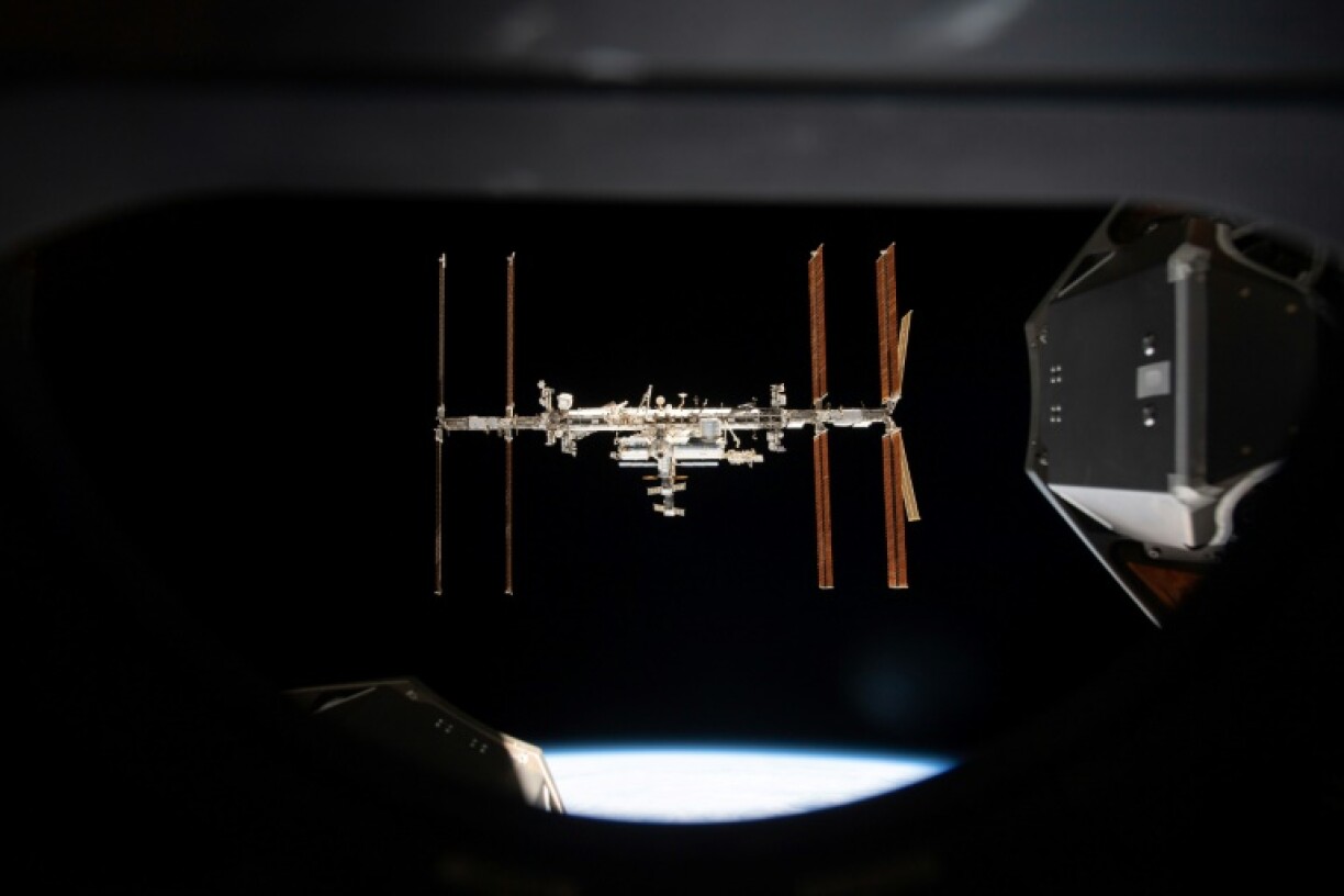 This handout image released by NASA on September 19, 2024 shows the International Space Station photographed from inside the SpaceX Crew Dragon Endeavour