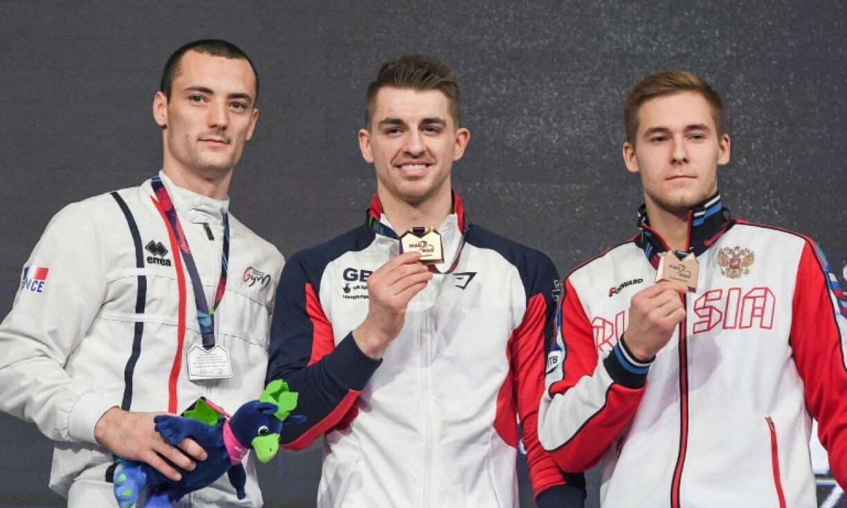 Vu lénks no riets: Cyril Tommasone, Max Whitlock, Vladislav Polyashov