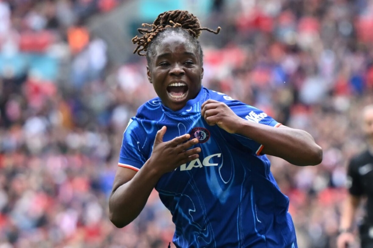 Double delight: Sandy Baltimore celebrates after scoring her second goal and Chelsea's third in their 3-0 Women's FA Cup final win over Manchester United at Wembley Stadium