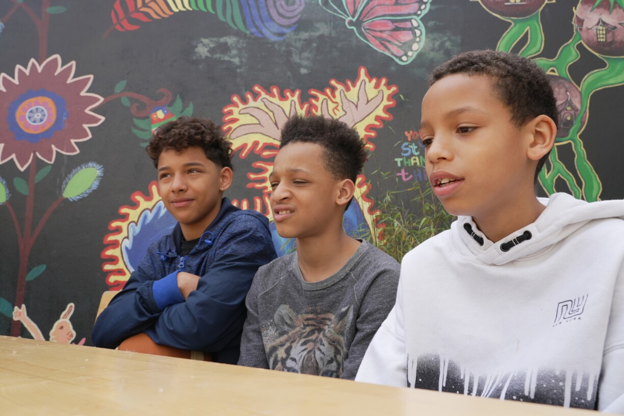 Brothers Kenny (centre) and Anderson (right) with their cousin Ismael (left).