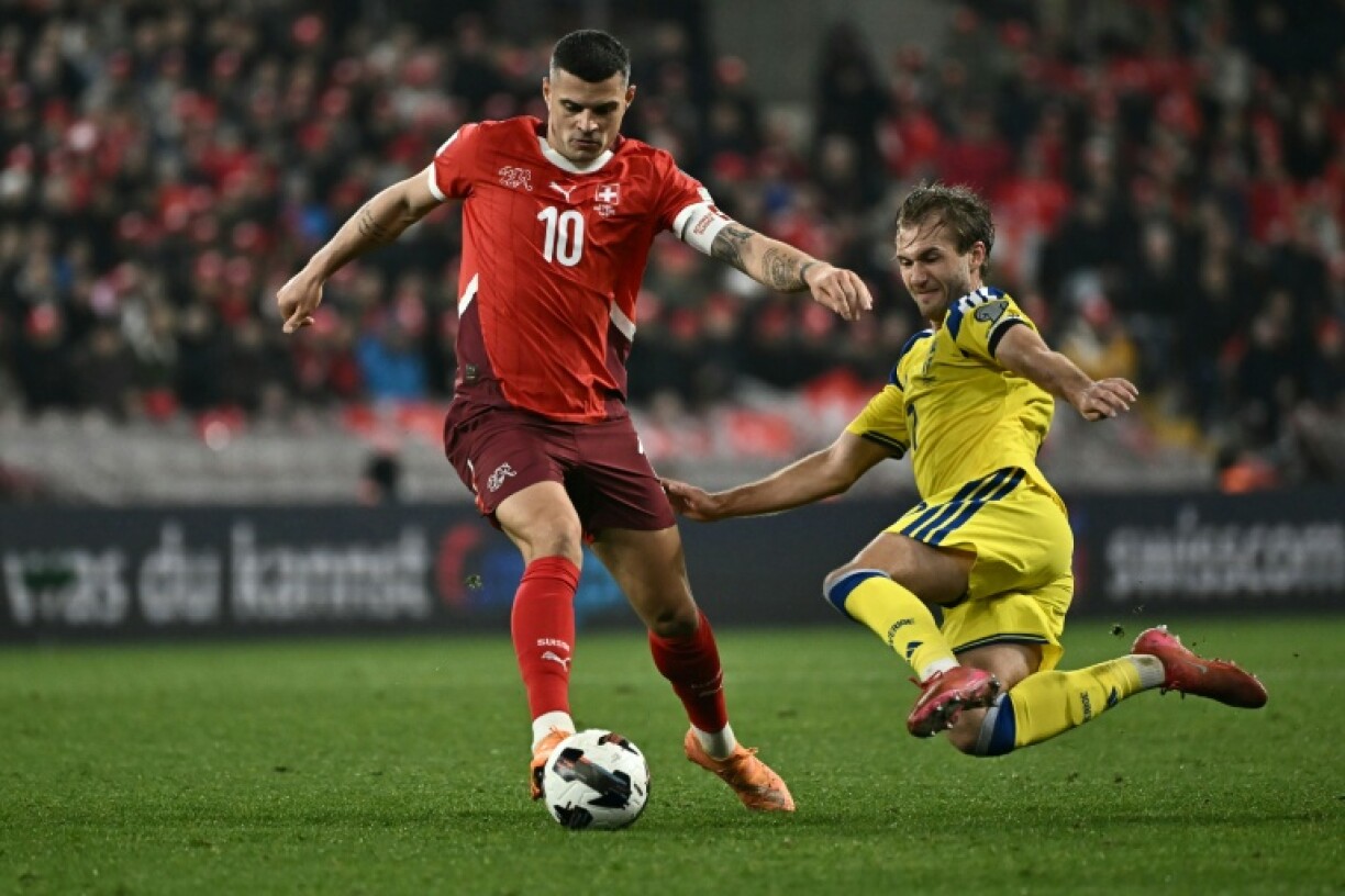 Granit Xhaka scored a penalty as Switzerland all but secured their spot in the finals