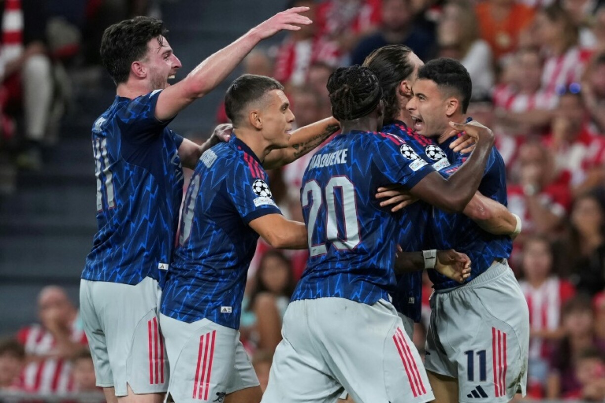 Arsenal players celebrate after Gabriel Martinelli gave the Gunners the lead away to Athletic Bilbao in the Champions League on Tuesday