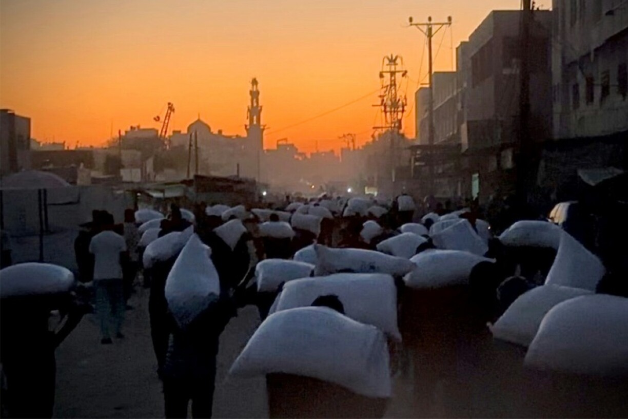 The scramble for what food aid gets in has been deadly, with huge crowds and crushes at aid points and around convoys