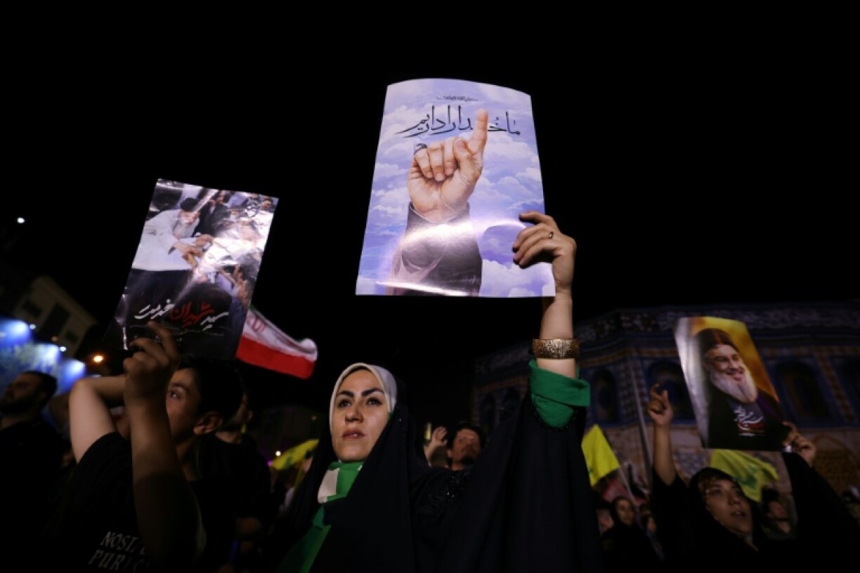 Des Iraniens manifestent à Téhéran en soutien aux tirs de missiles vers Israël le 13 juin 2025
