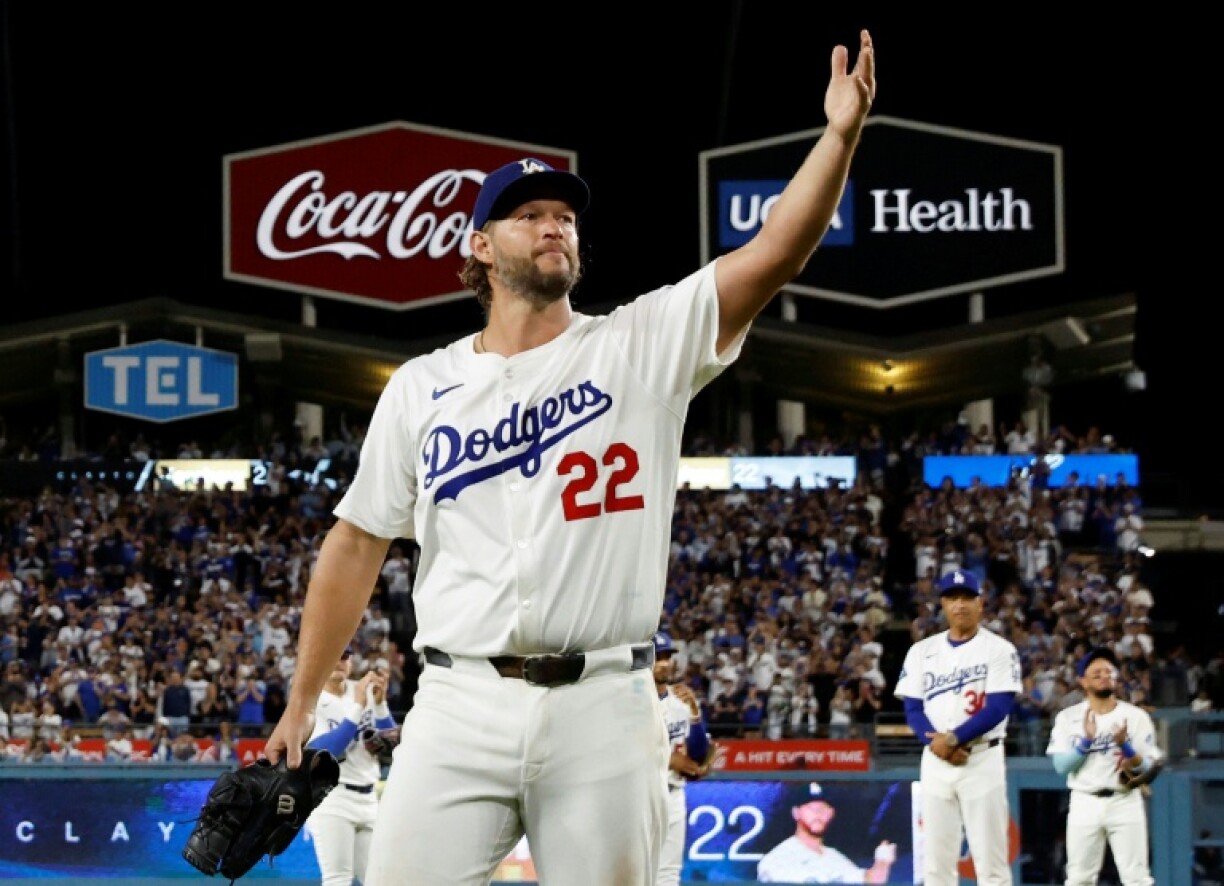 Los Angeles Dodgers pitcher Clayton Kershaw acknowledges fans as he departs his final regular-season start at Dodger Stadium