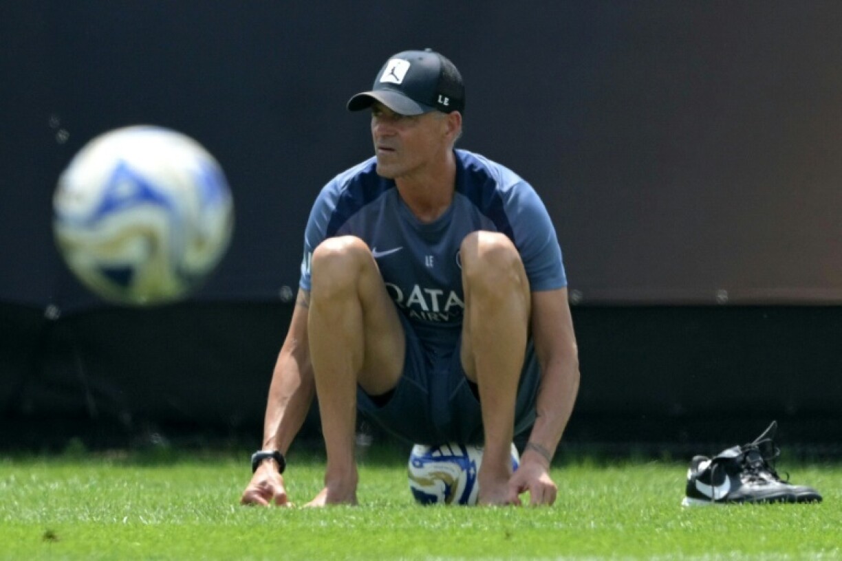 PSG coach Luis Enrique watches his team train at Rutgers University on Friday ahead of the Club World Cup final against Chelsea