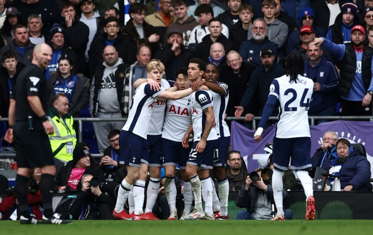 Tottenham celebrate after Brennan Johnson scored at Ipswich