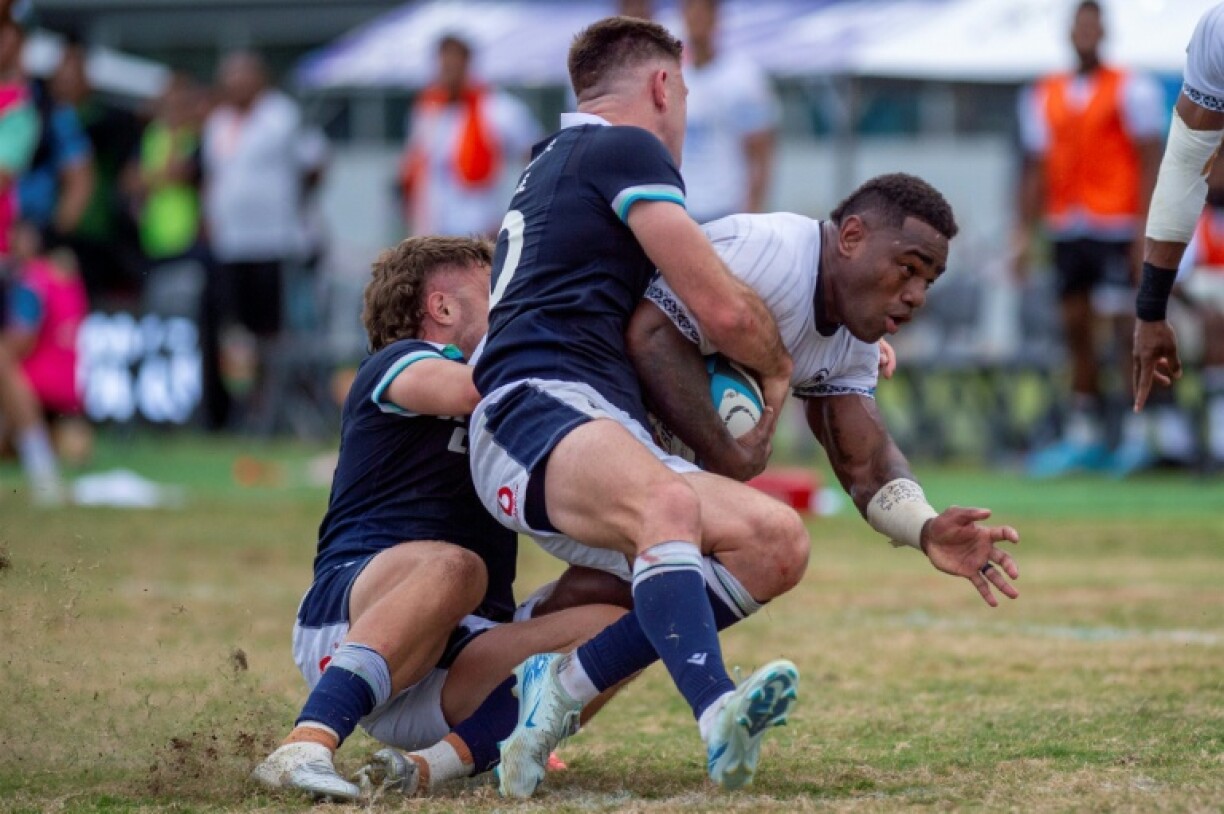Scotland's Fergus Burke tackles Fiji's Josua Tuisova during the rugby test match between Fiji and Scotland at HFC Bank Stadium in Suva on July 12, 2025.