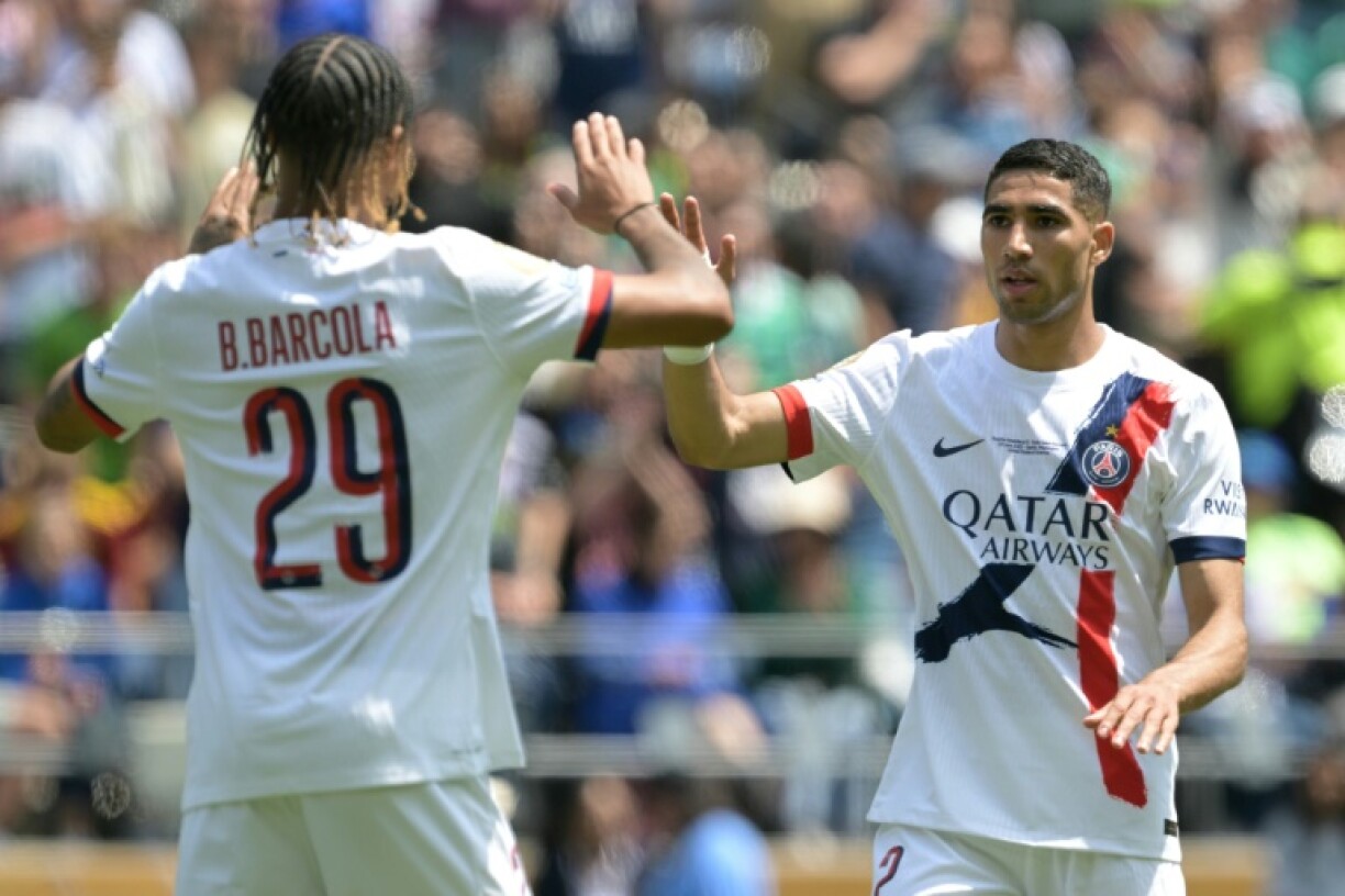 Achraf Hakimi (R) scored Paris Saint-Germain's second goal in their 2-0 win over Seattle Sounders at the Club World Cup on Monday