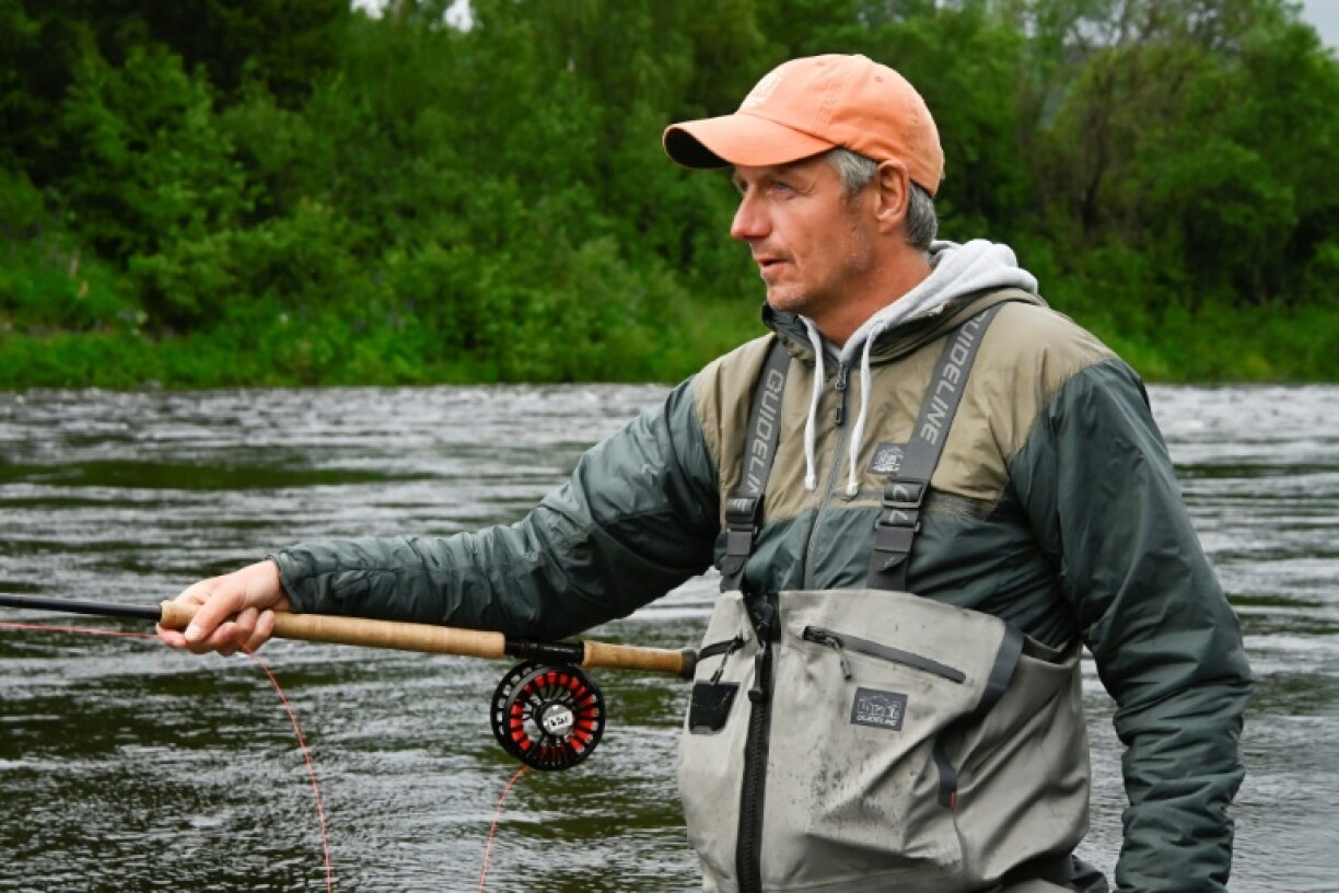 Christer Kristoffersen, a local angler, casts his line.. and catches nothing