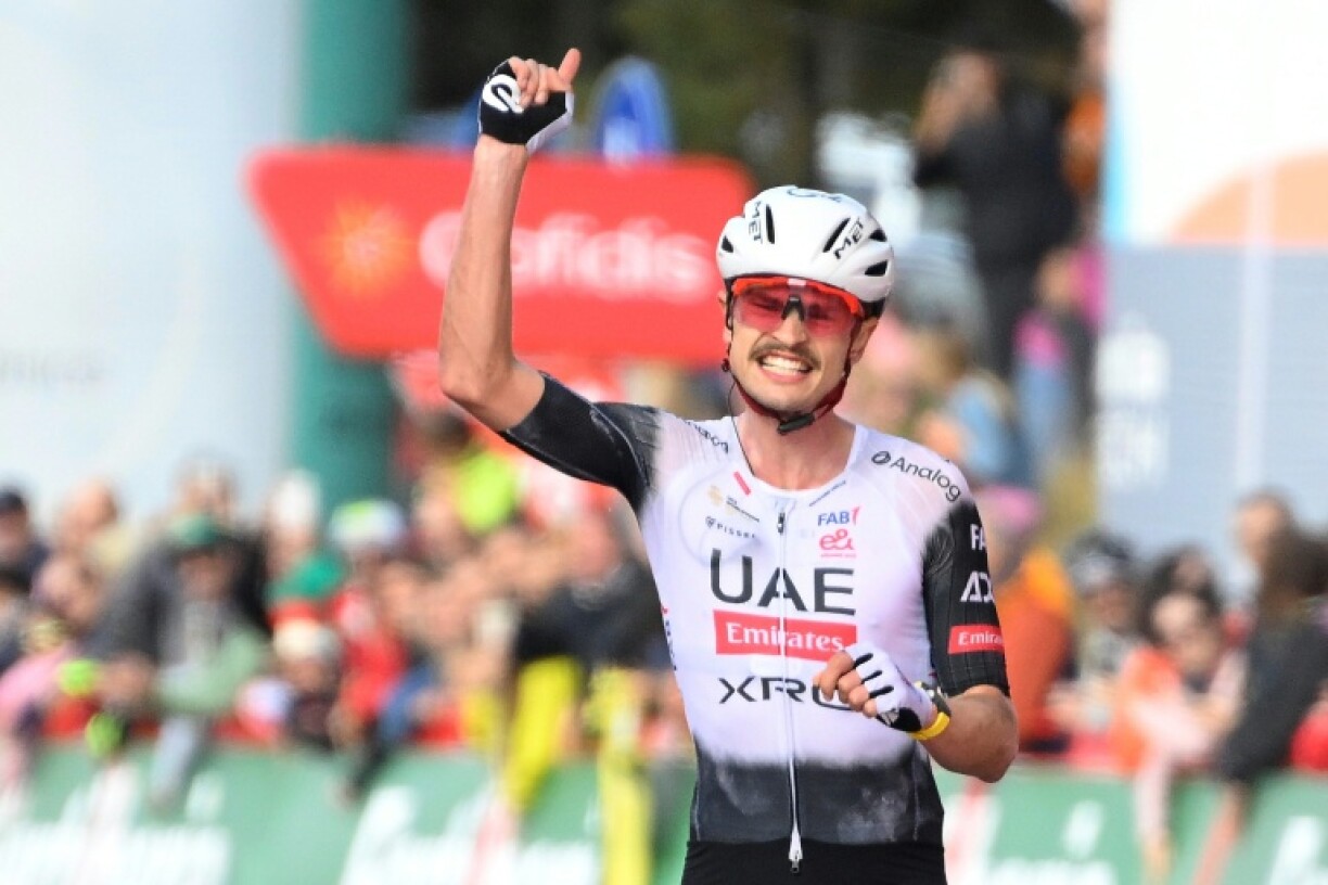 Team UAE's Australian rider Jay Vine celebrates winning the sixth stage of La Vuelta a Espana on Thursday