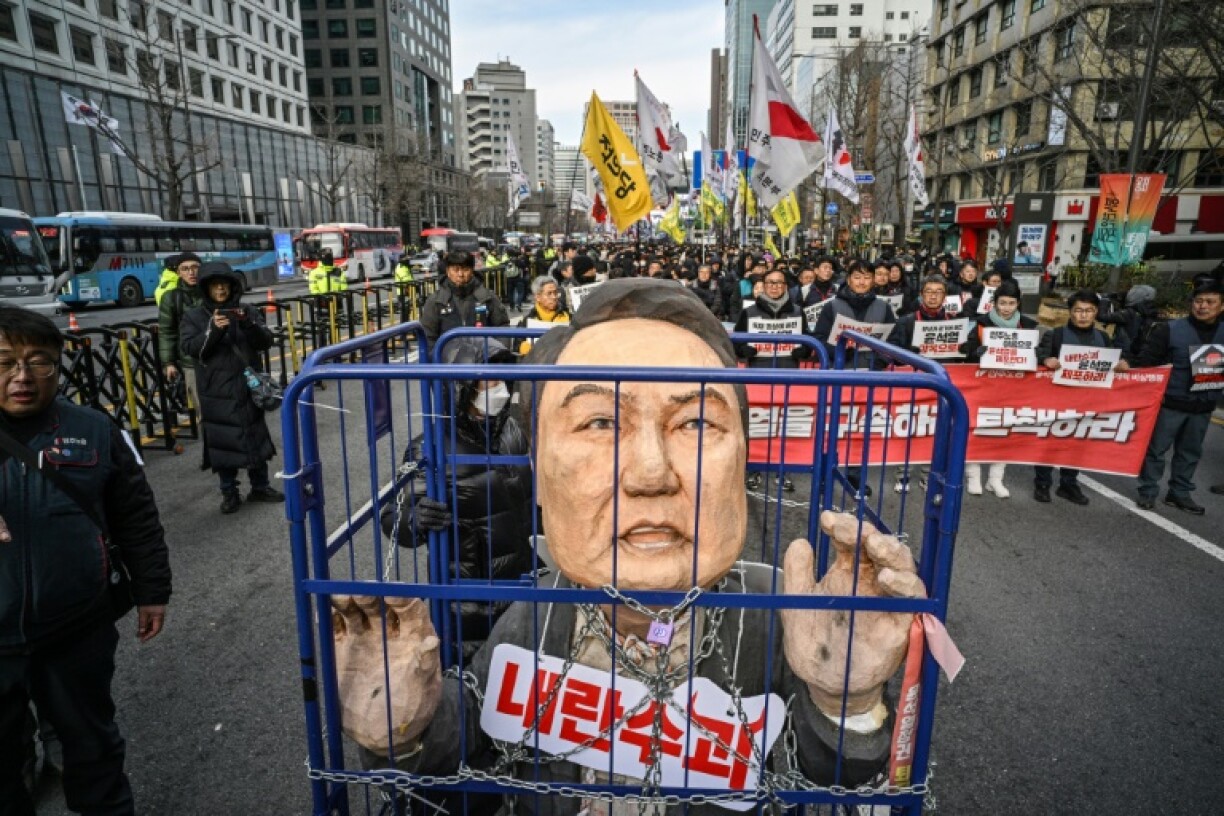 Demonstrators from a labour group take part in a protest calling for the ouster of South Korea President Yoon Suk Yeol outside City Hall in Seoul