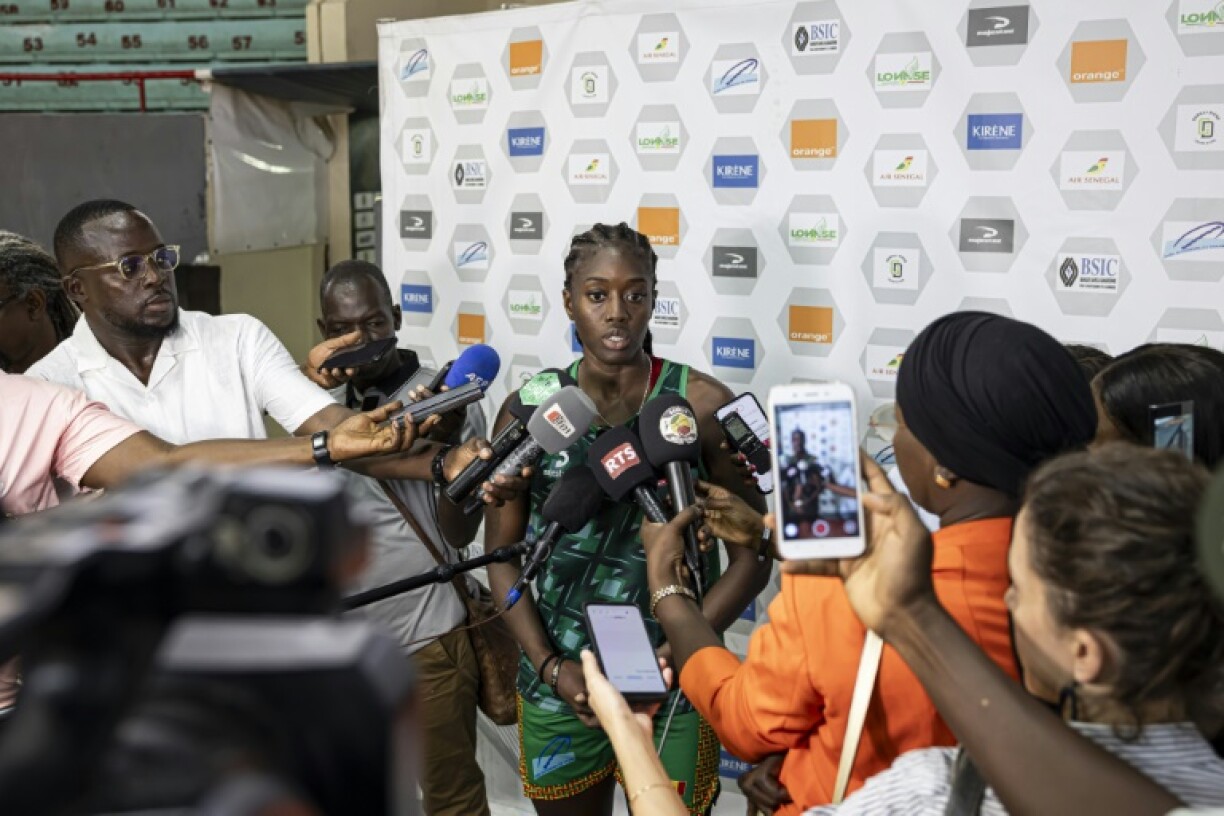 Senegal women's team captain Yacine Diop speaks to the press after training in Dakar on June 25, 2025