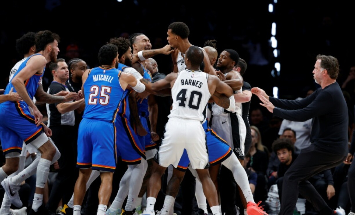 San Antonio's Victor Wembanyama trades shoves with Oklahoma City's Jaylin Williams as tempers flared in the Western Conference rivals' NBA season opener