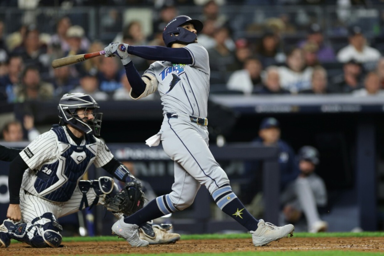 Victor Mesa Jr. of the Tampa Bay Rays hits a two-run home run against the New York Yankees in game three of their MLB playoff series
