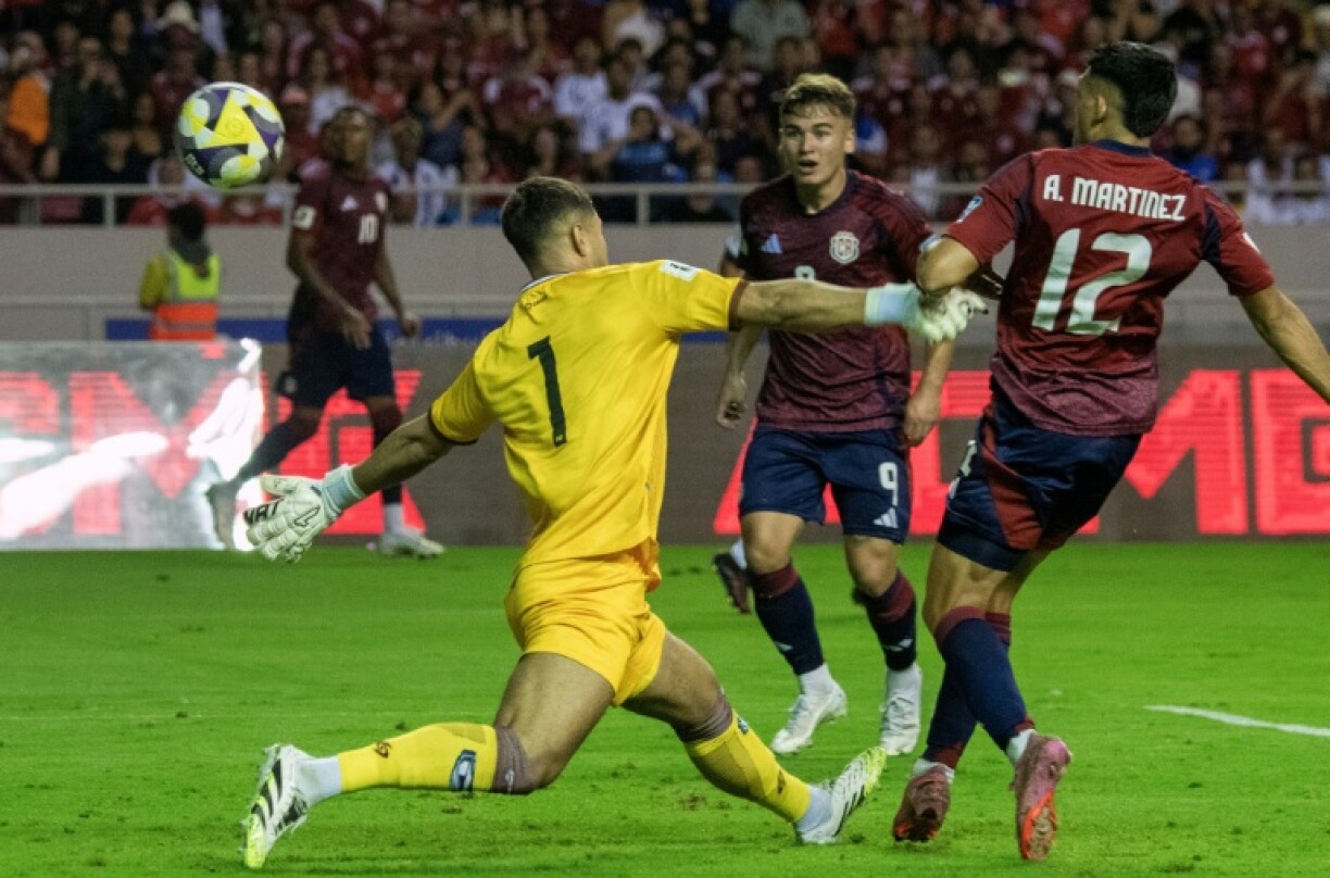 Costa Rica forward Alonso Martinez, right, shoots and scores a goal past Nicaragua goalkeeper Miguel Rodriguez, left, in a home victory in World Cup qualifying