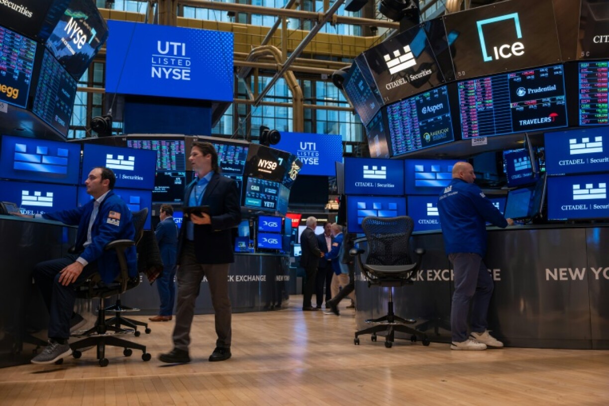 Traders work on the floor of the New York Stock Exchange (NYSE) on May 19, 2025 in New York City