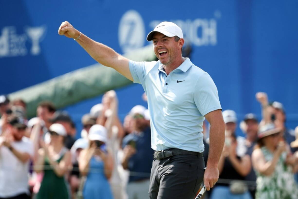 Reigning Masters champion Rory McIlroy celebrates making a 30-foot eagle putt on the 18th green in the third round of the PGA Tour Zurich Classic
