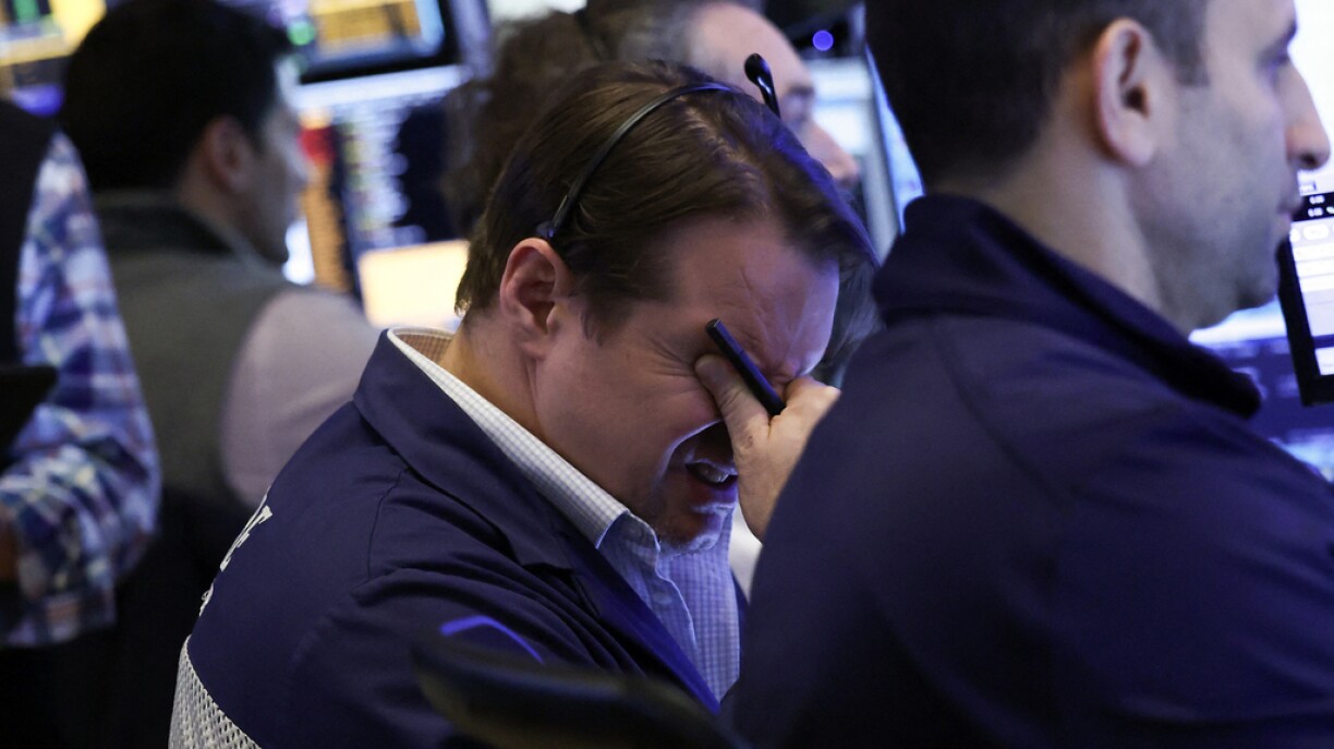 Traders work on the floor of the New York Stock Exchange (NYSE) at the opening bell in New York City, on April 3, 2025.