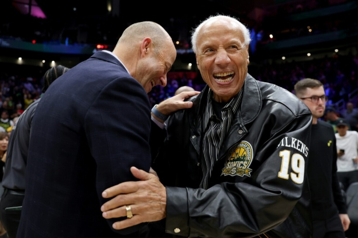 Lenny Wilkens, former Seattle SuperSonics head coach greets others before the Rain City Showcase in a preseason NBA game in 2023