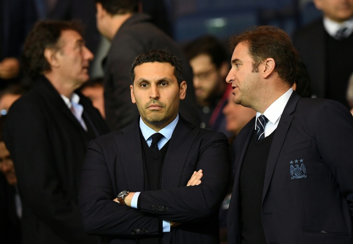 Manchester City chairman Khaldoon Al Mubarak (L) and chief executive Ferran Soriano at a Champions League match in Paris