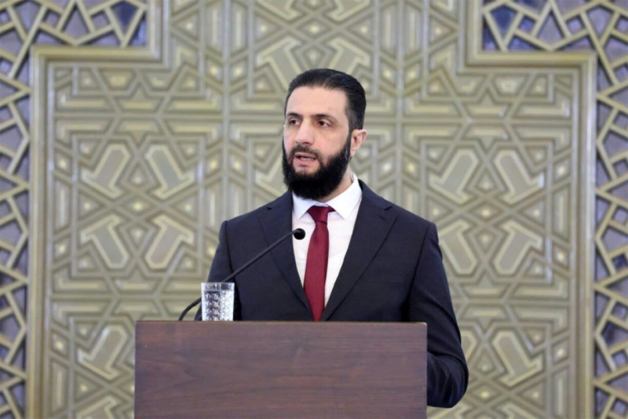 Syria's new interim president Ahmed al-Sharaa addresses a national dialogue conference in Damascus on the country's future after Bashar al-Assad's overthrow.