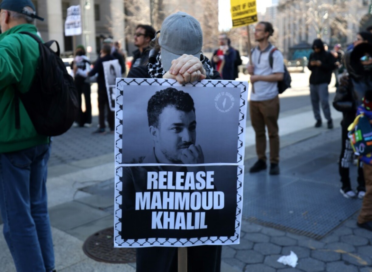 A protester in New York holds a sign calling for the release of pro-Palestinian activist Mahmoud Khalil