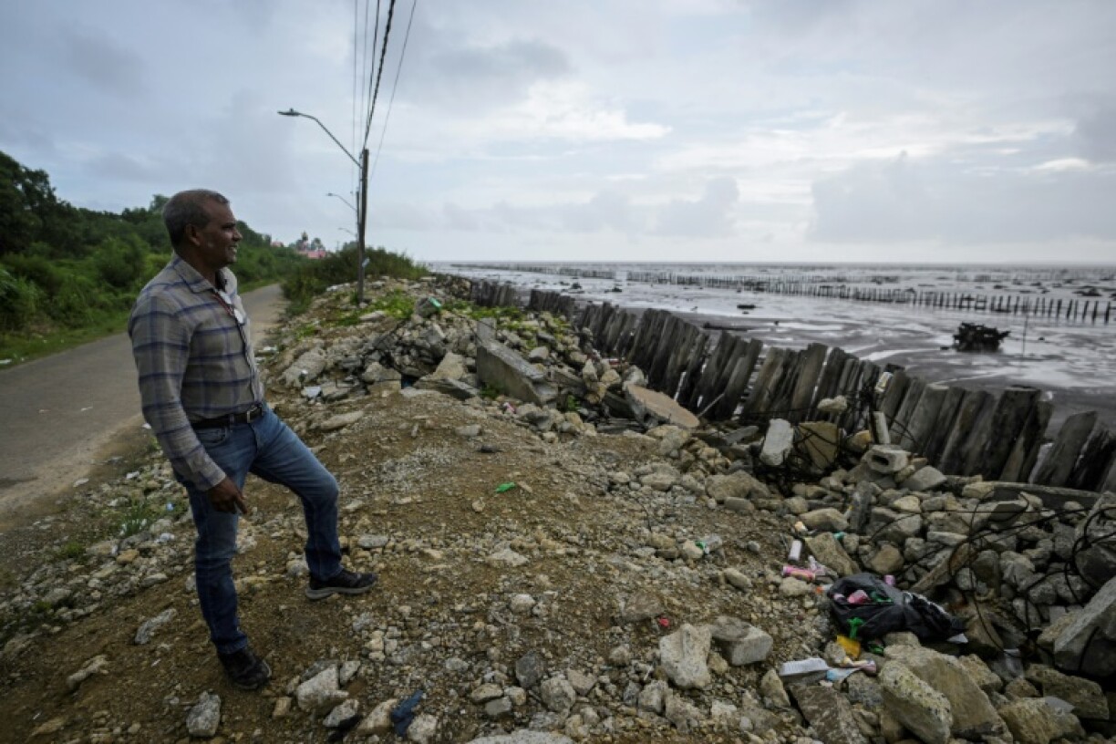 Professor Sieuwnath Naipal, a researcher at Anton de Kom University specializing in climate change and water management, led the mangrove restoration effort