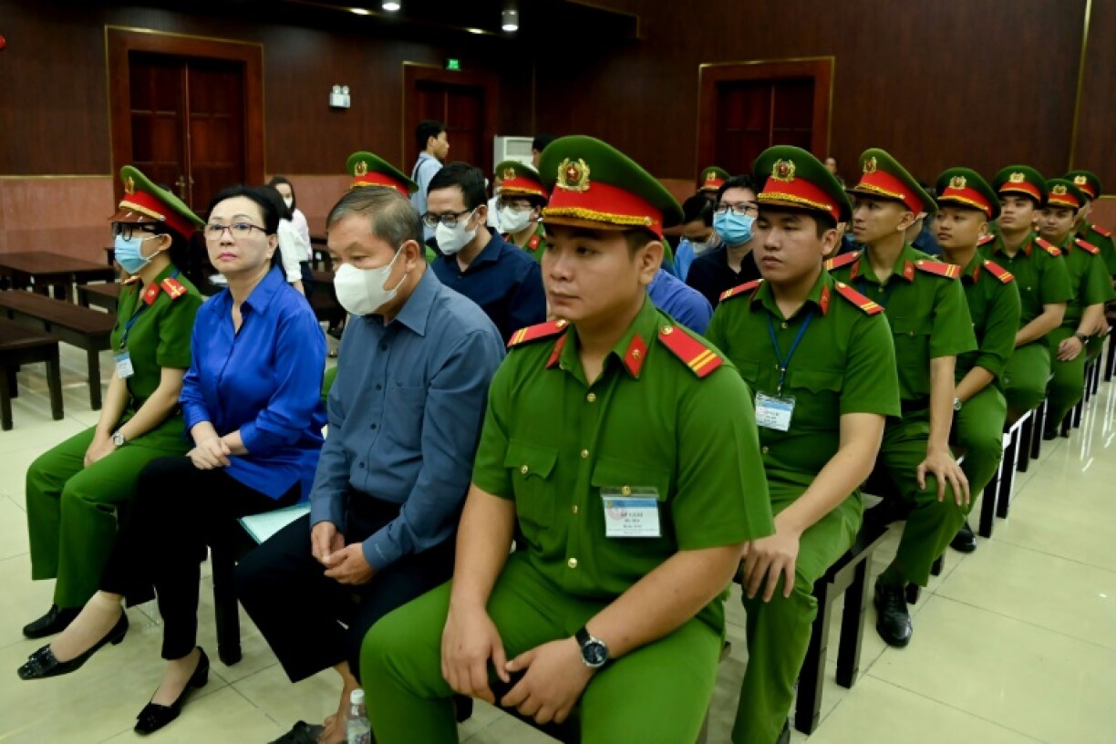 Property developer Truong My Lan (second from left) was convicted of swindling money from Saigon Commercial Bank -- which prosecutors said she controlled -- and sentenced to death for fraud totalling $27 billion