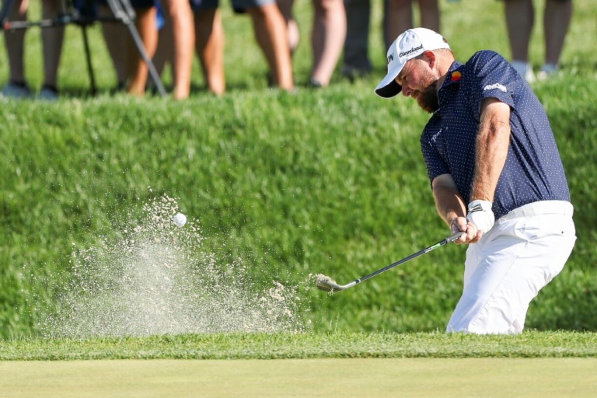 Ireland's Shane Lowry hits out of a bunker on the way to a share of the 54-hole lead at the PGA Tour Truist Championship