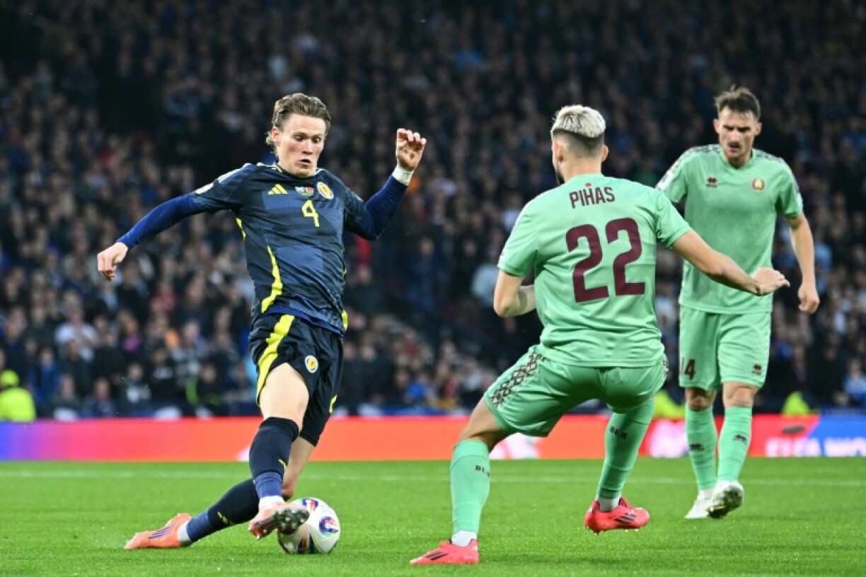 Scott McTominay (L) sealed an important victory for Scotland as he lashed home with his left foot on 84 minutes