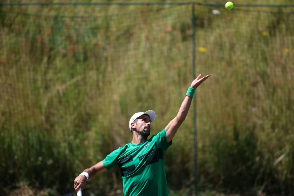 Seven-time Wimbledon champion Novak Djokovic practises at the All England Club