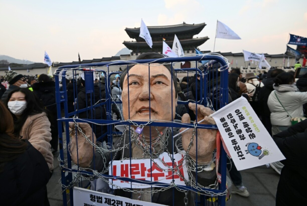 An effigy of South Korea's impeached President Yoon Suk Yeol at a rally calling for his ouster in front of Gyeongbokgung Palace at the weekend