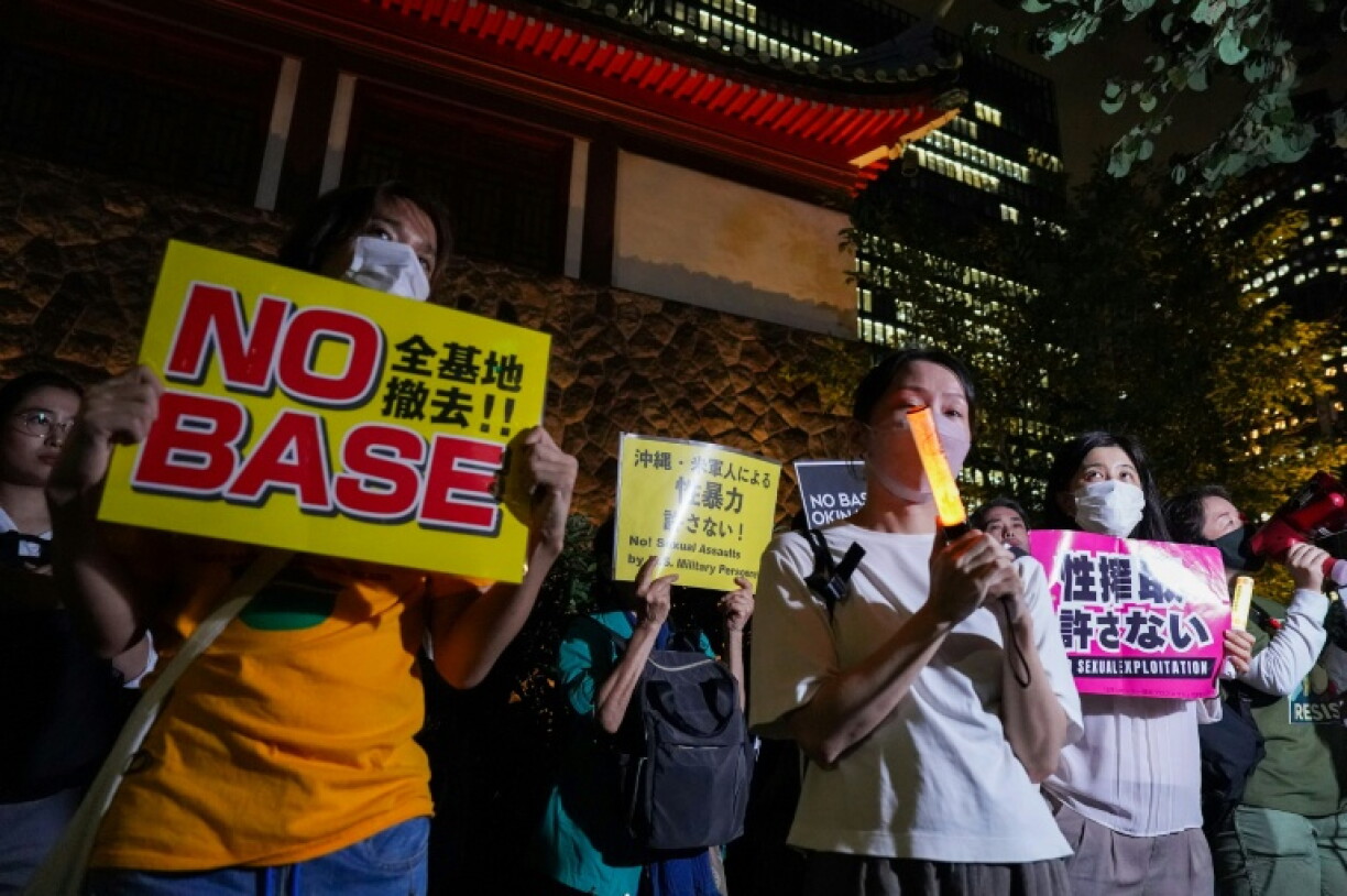 The killing of a Japanese woman has triggered protests against US military bases in Japan