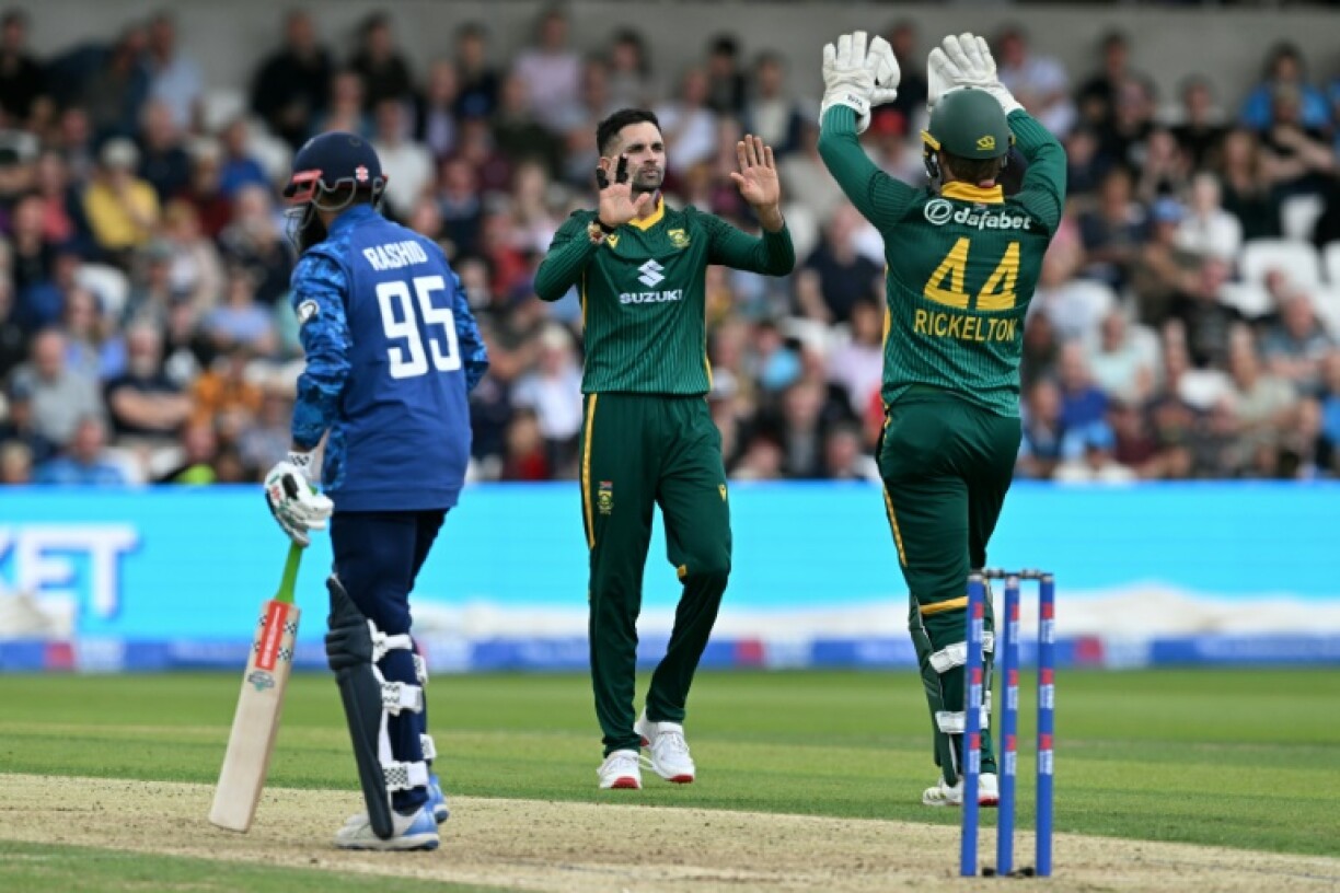 South Africa's Keshav Maharaj (centre) celebrates after dismissing England's Adil Rashid in the first ODI at Headingley